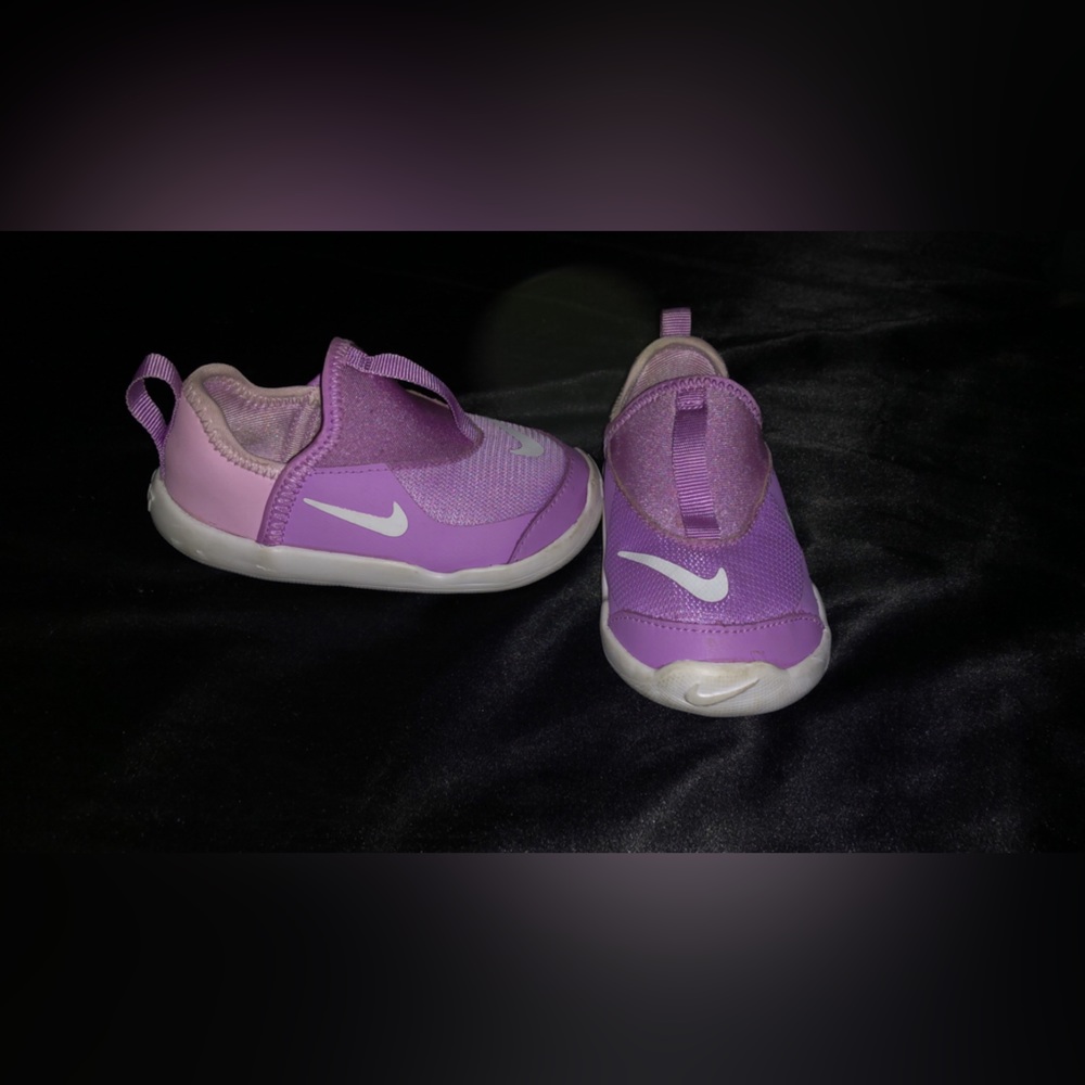 Purple Nike slip on sneakers